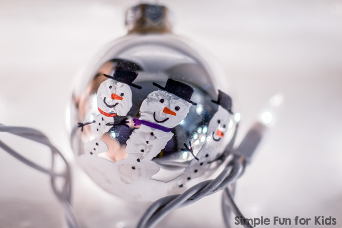 Handprint Snowmen Christmas Ornaments: A super cute quick Christmas craft for kids!