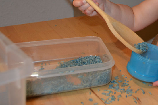 We had lots of fun and spent a lot of time exploring a simple Blue Rice Sensory Tub!