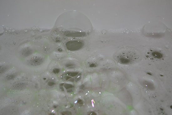 Blow soap bubbles on water - they'll stick around for a long time, look interesting, and be lots of fun to sit in and/or pop!