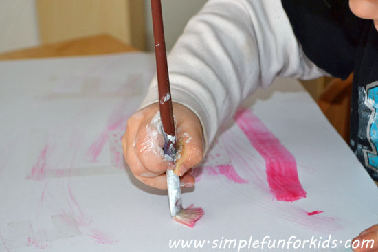 Make sticky tape resist initials by painting with watercolors over sticky tape!
