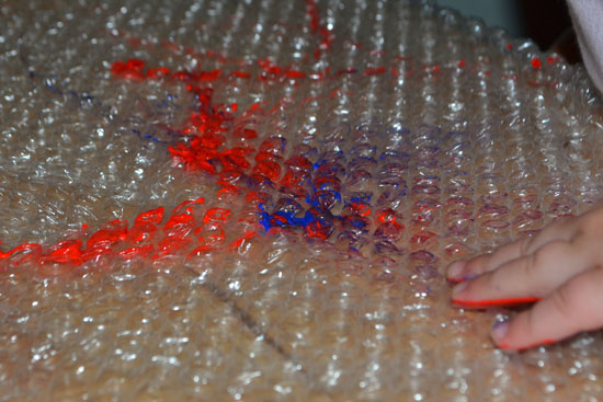 A really cool bubble wrap painting project for all ages that even a toddler can do completely on his own!