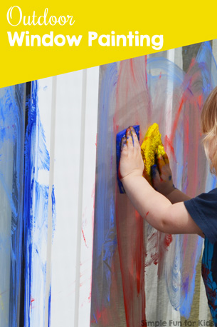 Large-Scale Toddler Art: Outdoor window painting on a big window!
