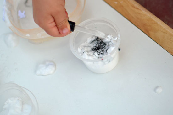 It looked like plain baking soda but with the help of some vinegar, it turned into Halloween Surprise Eruptions!