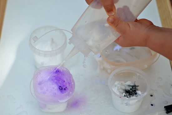 It looked like plain baking soda but with the help of some vinegar, it turned into Halloween Surprise Eruptions!