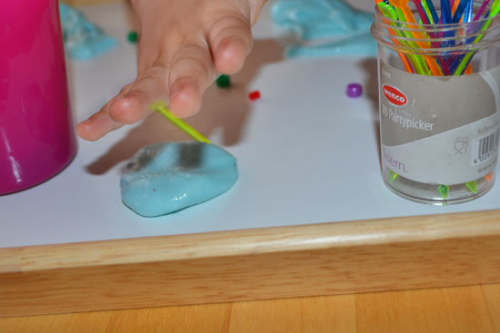 Low mess invitation to play with slime for older toddlers and up.