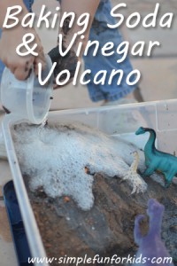 Baking soda and vinegar volcano from an old cloud dough sensory bin - lots of messy fun!