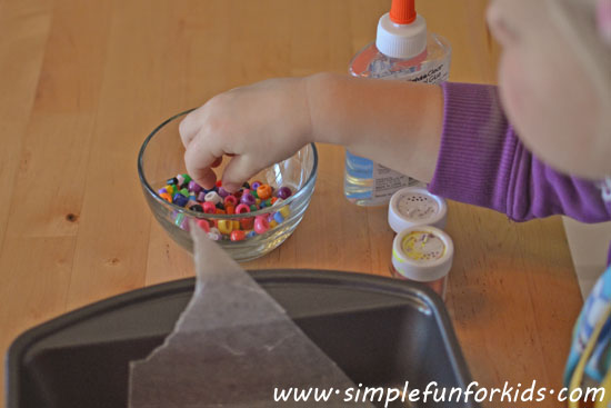 Glue star suncatchers with beads and glitter - a simple, fun craft for toddlers, preschoolers and up.