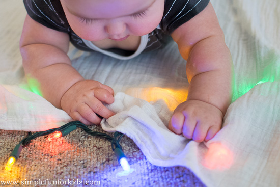 Baby Play with Christmas Lights: Beautiful and safe sensory play for tummy time!