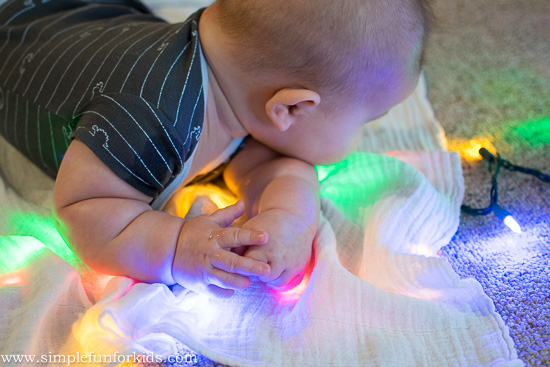 Baby Play with Christmas Lights: Beautiful and safe sensory play for tummy time!