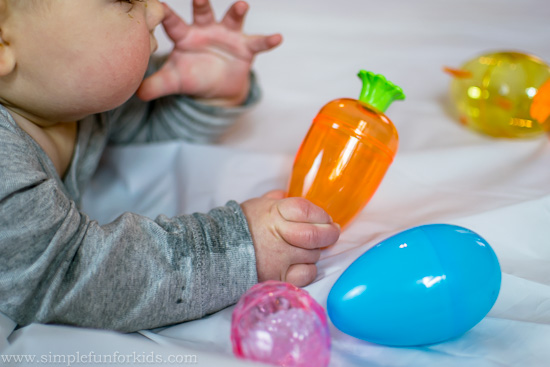 Preparing for baby's first Easter: Baby Play with Plastic Easter Eggs!
