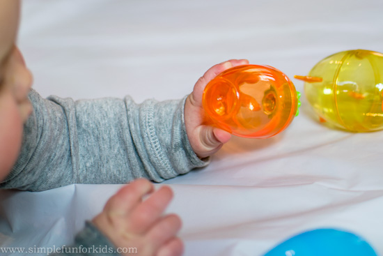 Preparing for baby's first Easter: Baby Play with Plastic Easter Eggs!