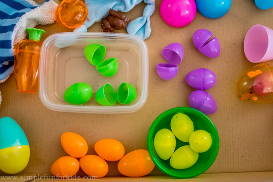 Baby can't sit up yet? Try a full body Easter sensory bin!