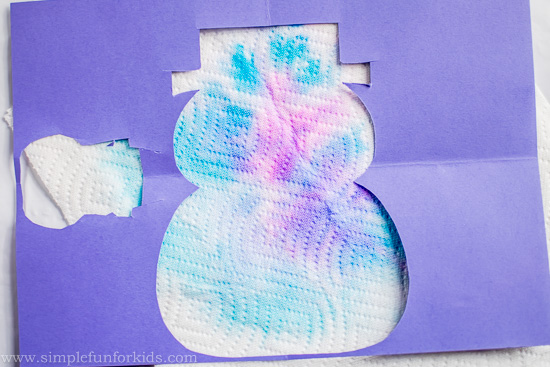 Winter Crafts for Kids: Super simple snowman suncatcher from a paper towel and construction paper!