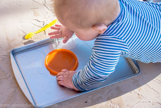 Sensory Activities for Babies: First Baby Play with Water!