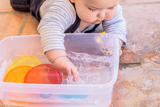 Sensory Activities for Babies: Simple Water Sensory Bin!