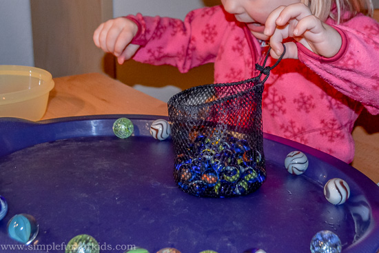 Sensory Play with Water Beads and Marbles: Exploring hard and soft and practicing fine motor skills!