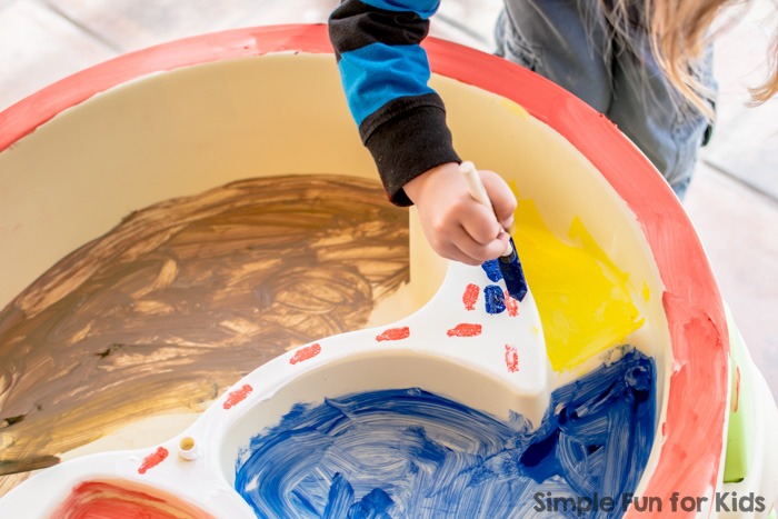 Super simple process art for kids: Painting the water table!