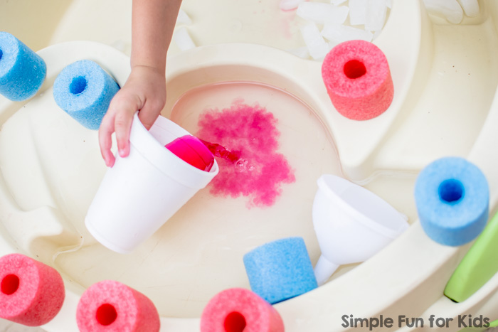 Water play for kids of all ages: Sensory soup with ice and pool noodles! Perfect simple summer fun!