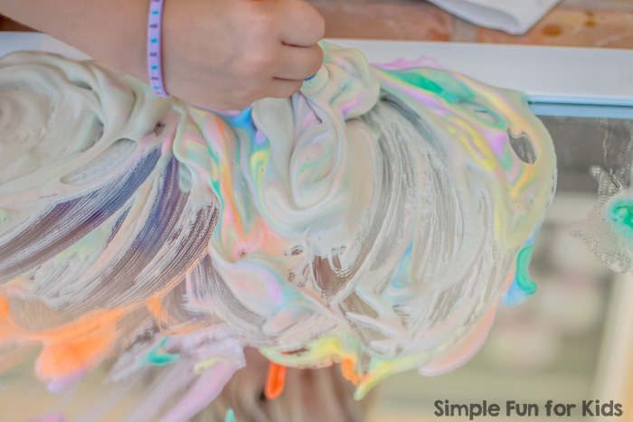 Sensory Art with Rainbow Shaving Cream Paint on the Mirror!