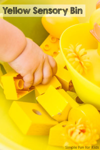Simple yellow sensory bin with items you have around the house as an introduction to colors for babies and toddlers!