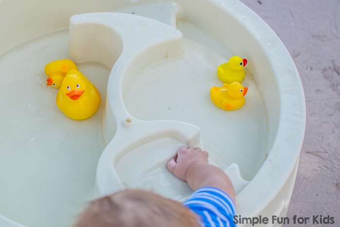 Fun for kids of all ages with a simple yellow sensory soup with rubber ducks - water play is always a hit around here!