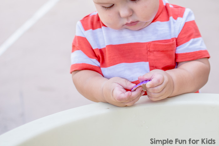 Sensory Activities for Kids: Simple Beach Sensory Play with sand, water, and sea shells in the water table! Perfect for sibling play or play dates!