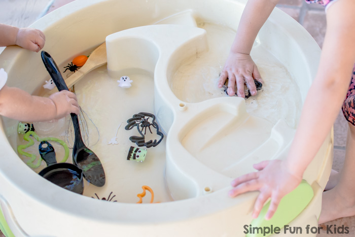 Simple sensory water play for kids of all ages, perfect for siblings: Halloween Sensory Soup