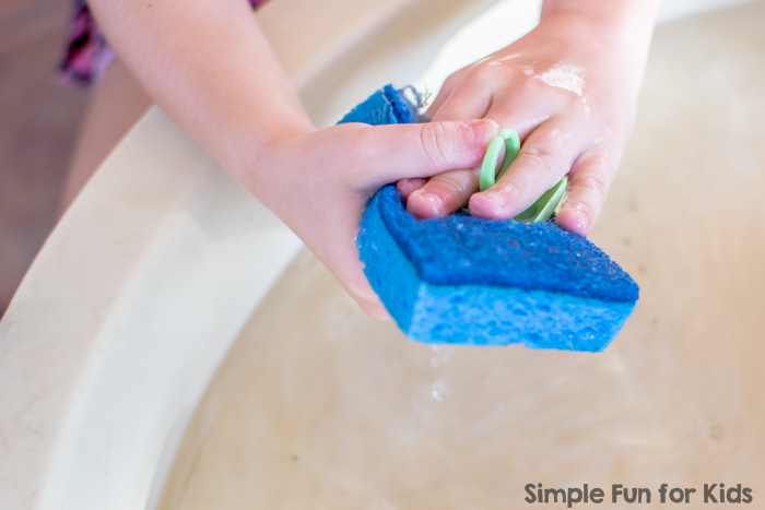 Simple sensory water play for kids of all ages, perfect for siblings: Halloween Sensory Soup