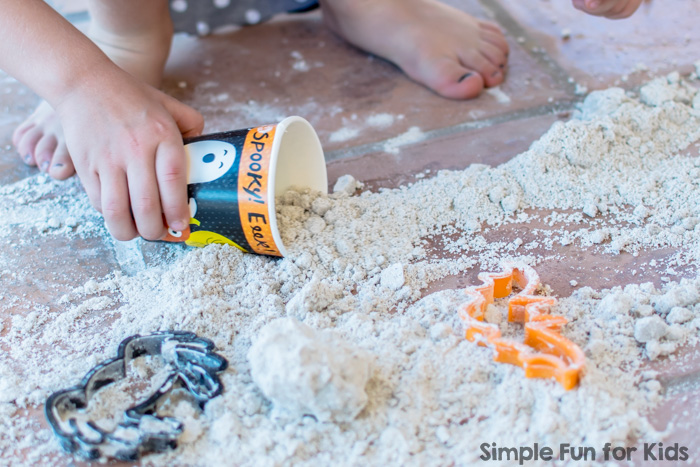 Sensory Activities for Kids: Sibling Play with Dried Out Halloween Quick Sand