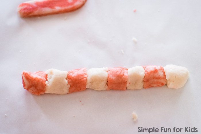 I hadn't used salt dough in decades, but now that we've tried it, I think we'll make a LOT of salt dough Christmas ornaments! Check out these simple salt dough candy cane ornaments from plain and colored salt dough!