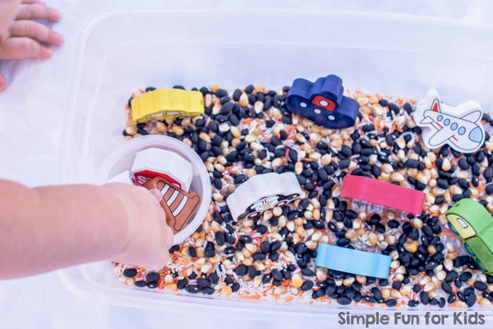Sensory Activities for Toddlers: Does your toddler love discovering new materials? Try a simple transportation sensory bin that's quick and easy to set up and offers so much to explore!