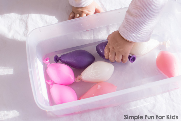 Simple Toddler Play: My son had a blast with this water balloon sensory bin! (Don't tell anyone, but my older preschooler was intrigued, too ;) )
