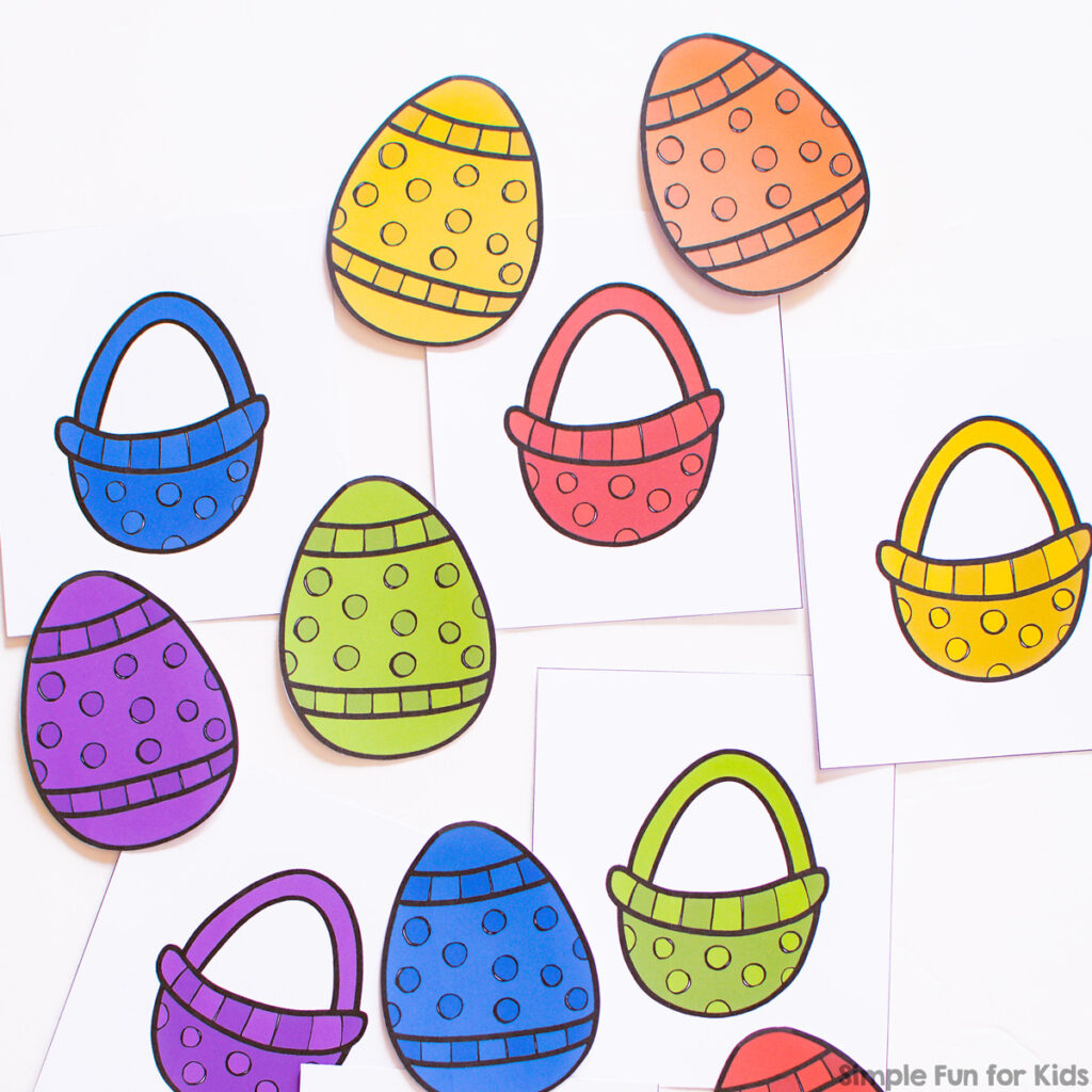 Matching cards with Easter baskets and Easter eggs in yellow, orange, blue, green, purple, and red on top of a white desktop.