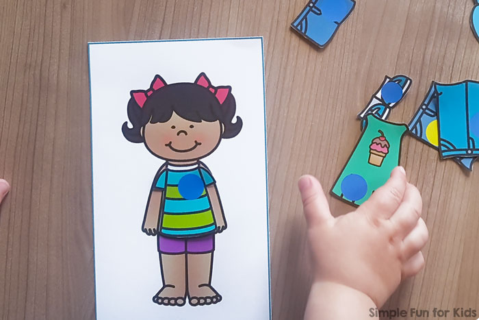 Practice colors with fun paper dolls using this cute printable Dress Up Kids Color Match! Yellow, blue, red, and green, perfect for toddlers and preschoolers.