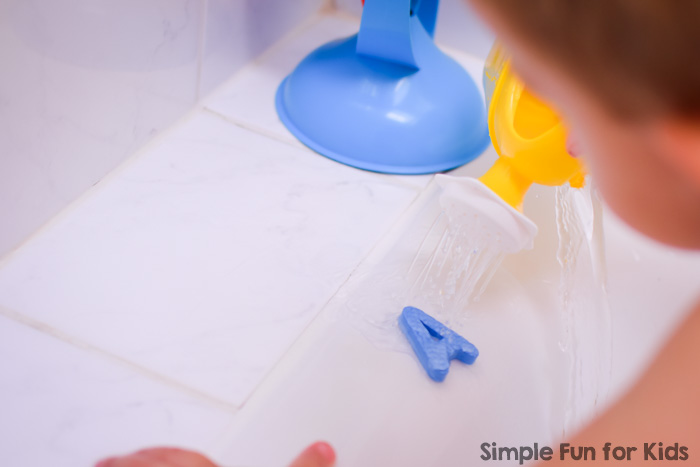 Super simple non-messy sensory literacy activity in the bathtub: Washing Away Foam Letters, perfect for toddlers and preschoolers.