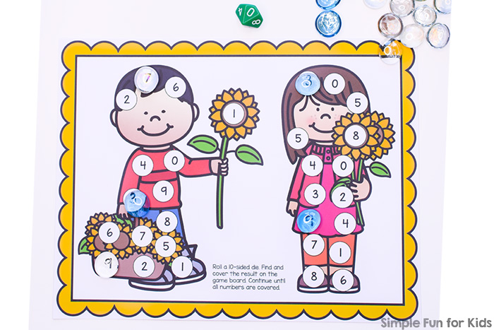Practice number recognition and taking turns with this cute Sunflower Kids Roll and Cover Game! Day 7 of the 7 Days of Sunflower Printables for Kids series.