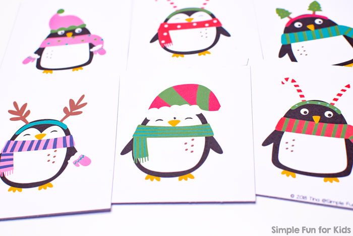 Perfect for little toddler hands: Christmas Penguin Matching Game with six large matching cards featuring the cutest penguins dressed up for Christmas.