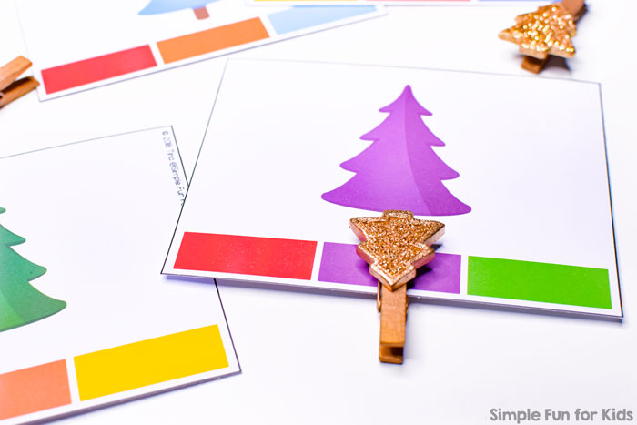 Practice colors and fine motor skills with these cute rainbow Christmas Tree Color Matching Clip Cards! Wonderful for preschoolers and toddlers learning their colors.