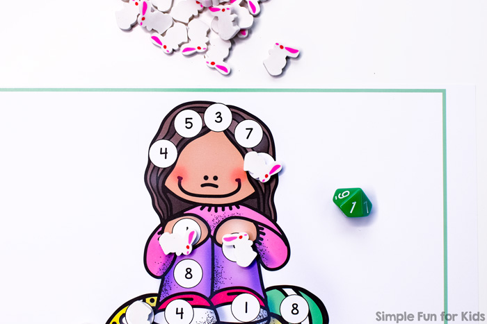 Practice number recognition, taking turns, and other great skills with this cute printable Easter Egg Hunt Roll and Cover Game for preschoolers and kindergarteners. Part of the 7 Days of Easter Egg Printables for Kids series.