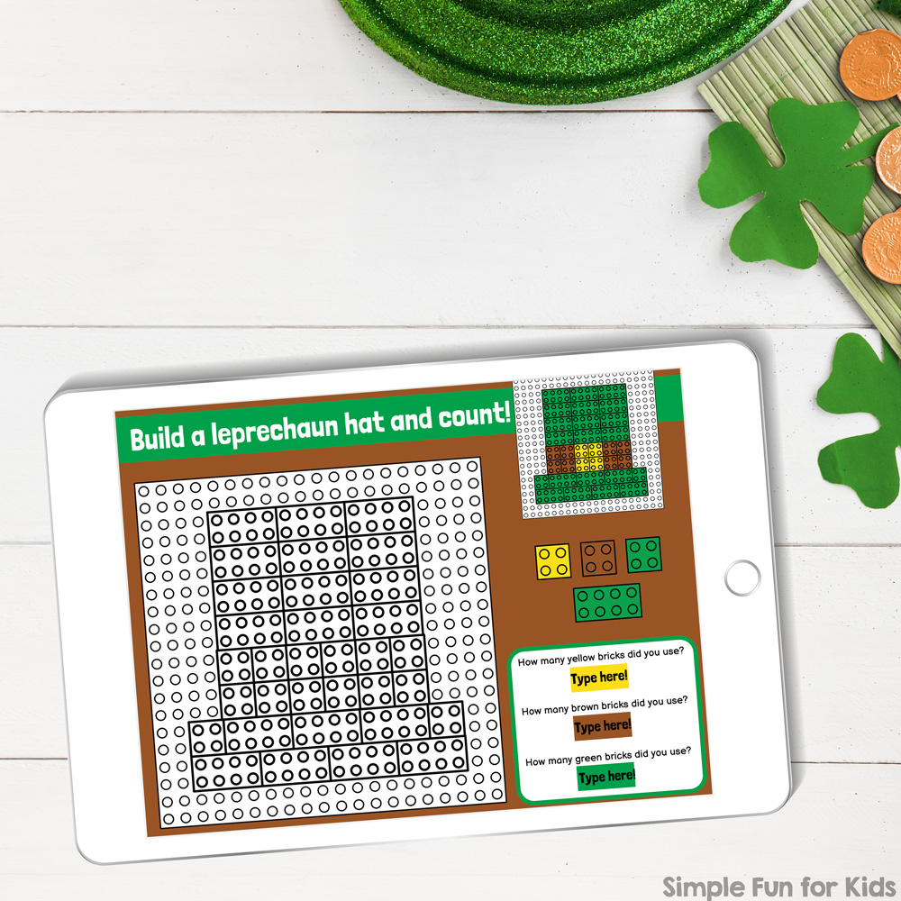 Picture of an iPad on top of a white desk with shamrocks on it. On the iPad is a slide from the digital LEGO product showing a leprechaun hat that's to be assembled from digital LEGO bricks.