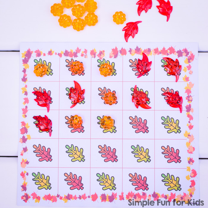 Play this simple dice game with your preschooler: Fall Leaves Grid Game!