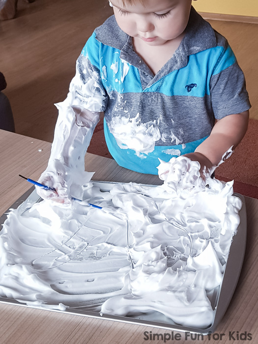 Read all about my toddler's first mark making in shaving cream experience! Simple, fun, very sensory, and great as a pre-writing activity!