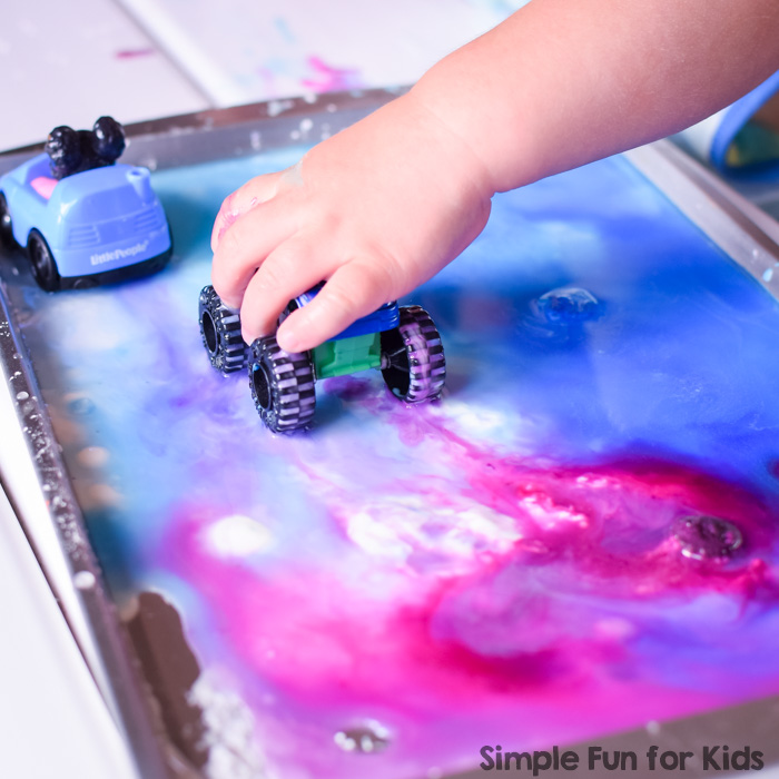 We love simple low-mess sensory play for toddlers, preschoolers, and kindergarteners! My 2-year-old added his own personal spin on this Goopy Car Park Sensory Play activity and had an absolute blast! Goop only requires 3 simple ingredients that you probably have on hand right now.