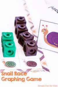 My preschooler practiced graphing, counting, color words, and tally marks with this printable Snail Race Graphing Game!