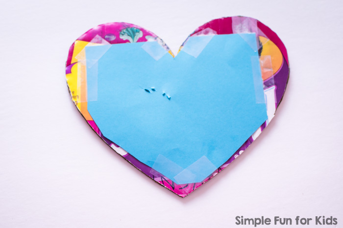 Use your toddler's art work to make this super simple heart picture frame craft! Great for Valentine's Day or just to display a favorite photo.