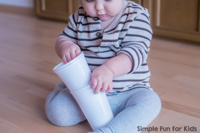 Quick and simple activity to keep your toddler busy with minimal supplies: Toddler Boredom Buster with Cups and Cotton Balls