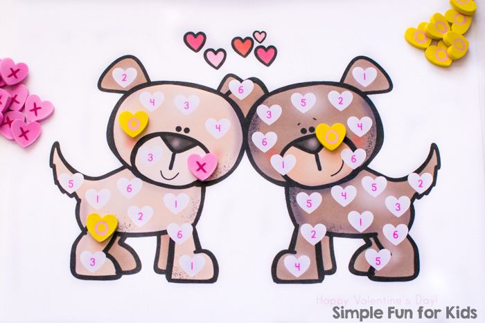 Quick and simple math games for kids: Try this cute Valentine's Puppies Roll and Cover Game with your preschooler or kindergartner! Simply print the pdf file, grab a die and a few manipulatives, and play!